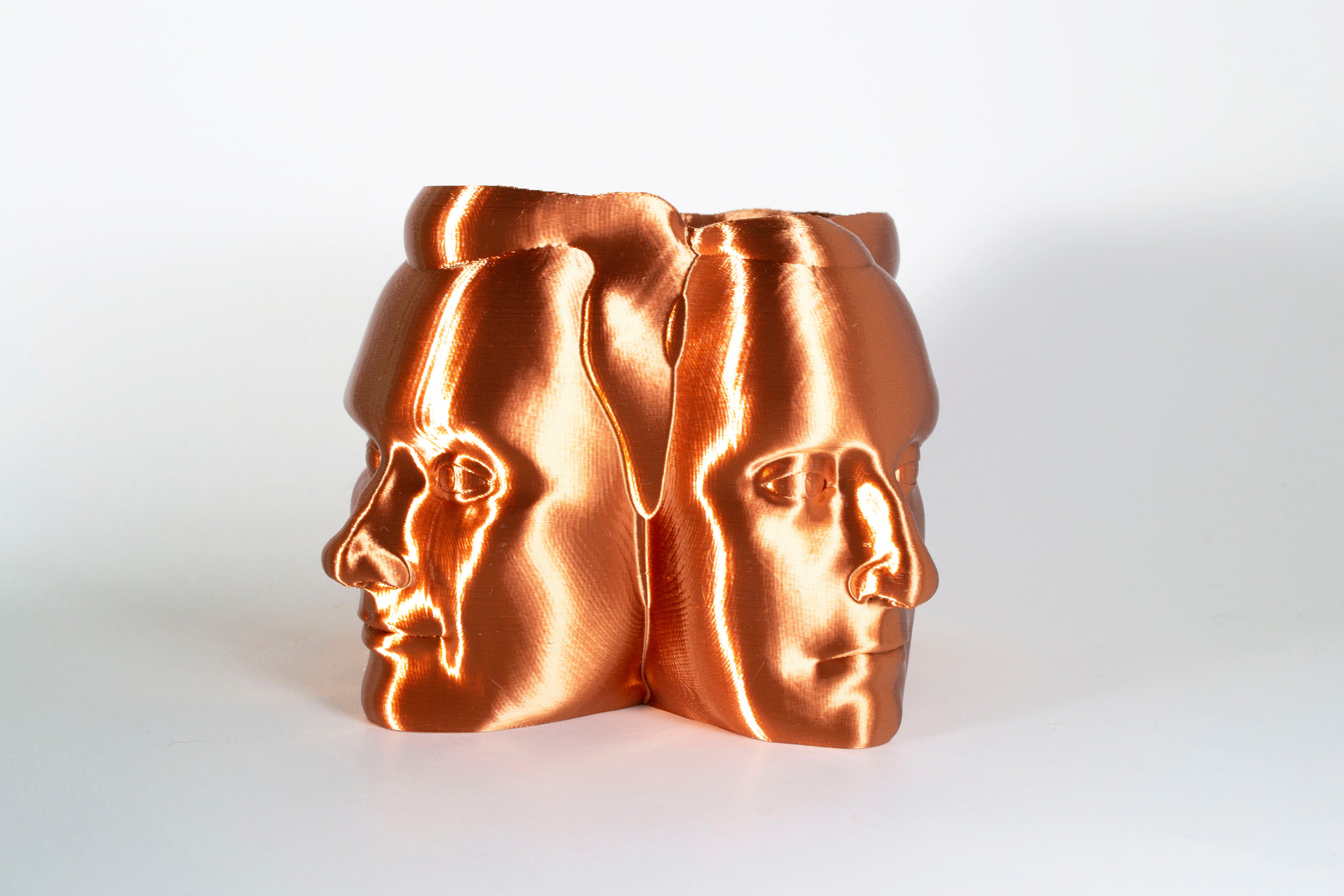 copper mount rushmore planter